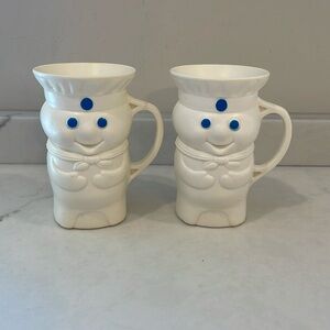 Two PILLSBURY POPPIN-FRESH DOUGHBOY plastic cups